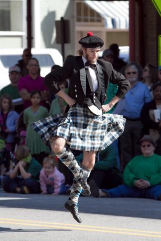 A dancer performs an Irish dance.