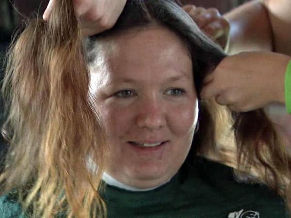 Fayetteville mom shaves head for sons with cancer