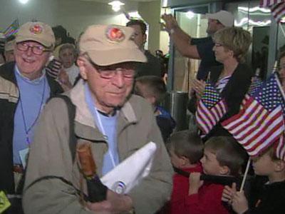 Local veterans return from Triangle Flight of Honor