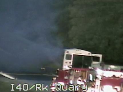 Bus fire closes ramp at I-40W, Rock Quarry Road